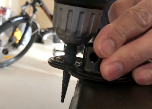 If the coupler size is too small, use a step drill bit to enlarge its size.